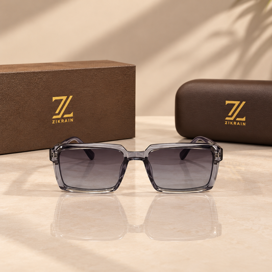 Zikrain Slay — flat-top rectangular sunglasses in smoke-grey acetate with gold temple inlay and gradient UV400 polarized lenses