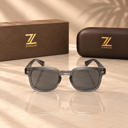 Zikrain Halo — rounded panto sunglasses in frosted grey acetate with gold rivet detail and UV400 polarized lenses